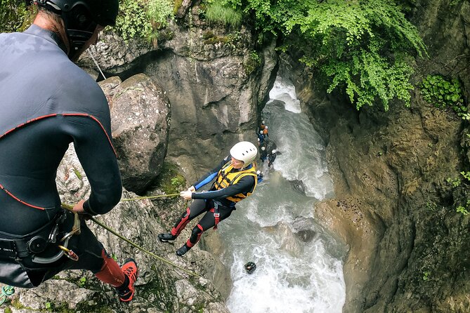 Canyoning Interlaken with OUTDOOR - The first big moment: a 10m rappel into the canyon