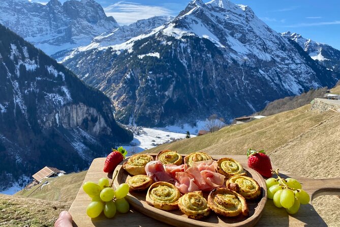 Flavours of Switzerland Luxury Private Tour from Zurich & Lucerne - Lake Lucerne viewpoint: luxury cheese board with Swiss bread