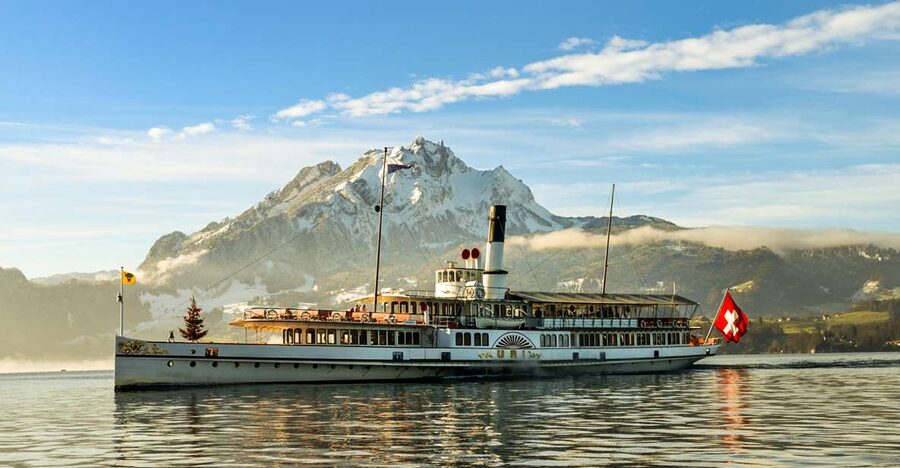 From Lucerne: Mt. Pilatus Gondola, Cable Car, and Boat Trip - Entering Lucerne’s Mt. Pilatus loop from the train station