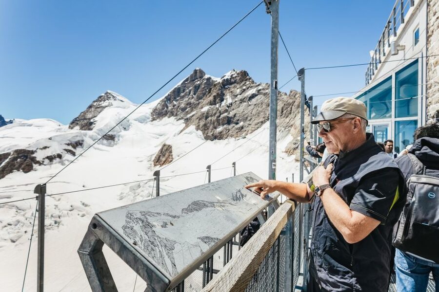 From Zurich: Day Trip to Jungfraujoch - Top of Europe - Ice Palace tunnels: walking inside the glacier’s inside-out world