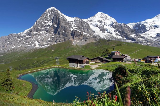 Jungfraujoch Day Trip from Lucerne with Eiger Express Gondola - Ice Palace Tunnels: Glacier Ice With a Theme Park Twist