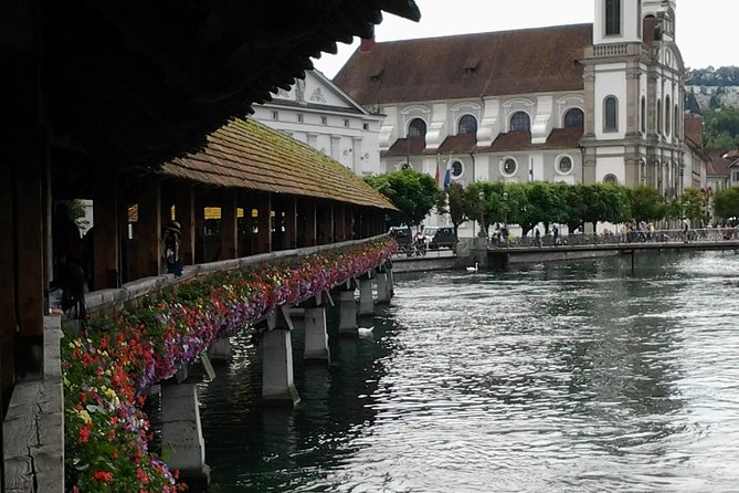 Lucerne Private City Walk and Lake Cruise Day Trip from Zürich - Rathausquai, the town hall area, and the Hotel des Balances murals