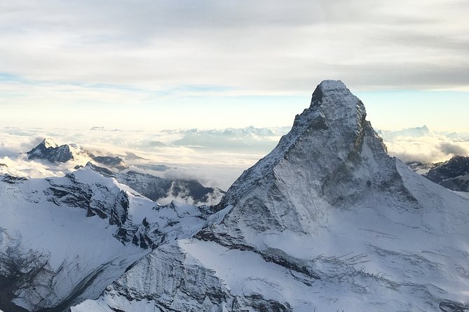 Matterhorn helicopter tour - longest scenic flight from Bern over the Swiss Alps - Stop 4: Oeschinensee, turquoise water that looks almost unreal