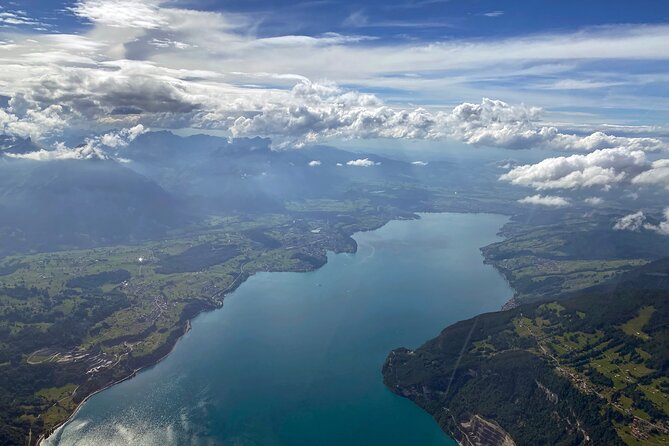 Private helicopter flight to Stockhorn mountain, with view to the Swiss Alps - Emmental meadows, Langnau, and why cheese is not a marketing slogan