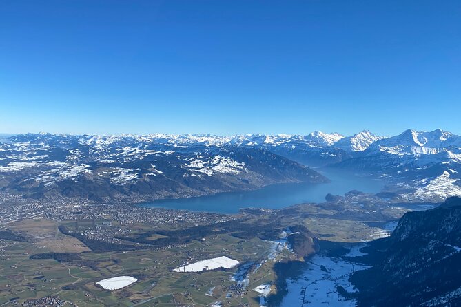 Private helicopter flight to Stockhorn mountain, with view to the Swiss Alps - From Bern-Belp to Lake Thun, where the turquoise really comes from