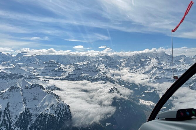Private helicopter tour to the Swiss Alps - see the Eiger, Monch and Jungfrau - Entering The Swiss Alps From Bern-Belp in a 42-Minute Helicopter Run