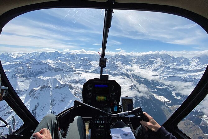 Private Swiss Alps helicopter tour over snow covered mountain peaks and glaciers - Stop 2: Schilthorn, Film History, and the Bond-Style View