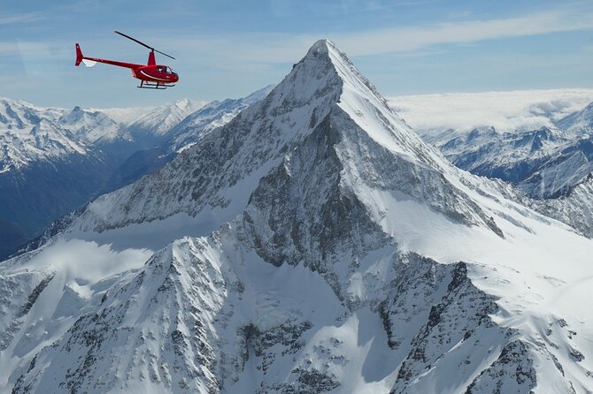 Private Swiss Alps helicopter tour over snow covered mountain peaks and glaciers - Where You Start: Belp and the Easy In-and-Out Rhythm
