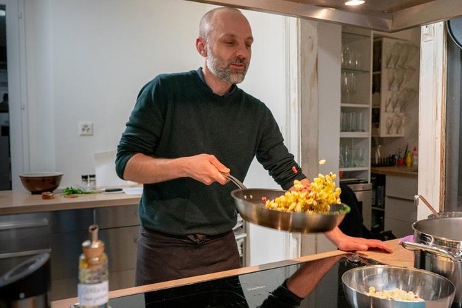 Private Swiss Cooking Class in Kriens with a Professional Chef - Restaurant ambience: warm lighting, handmade tables, and quirky décor