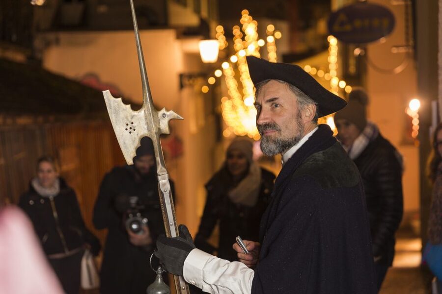 Walking Tour with the Night Watchman - Stepping off at Lindenhof and into Zurich Old Town after dusk