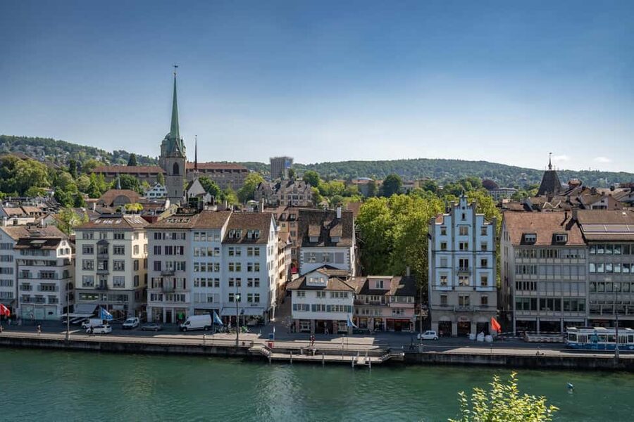 Zurich: 360° city walk including hidden spots - St. Peter’s Church and Munsterhof: the medieval core with real purpose