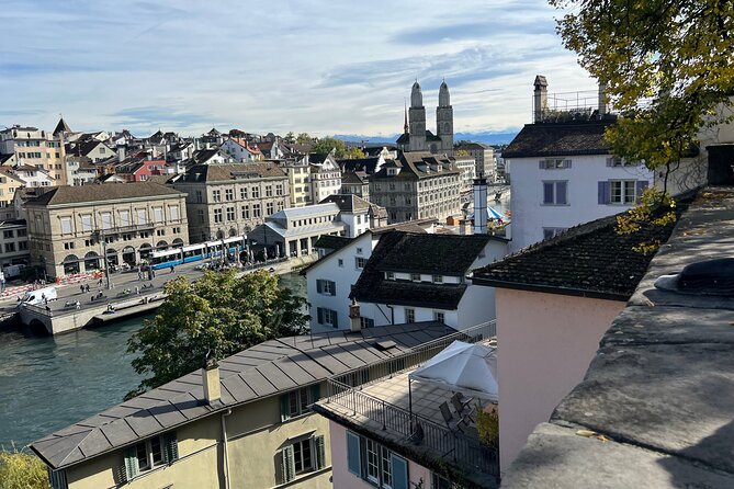 Zurich Food Tour with 10 Local Delicacies, Cheeses & Chocolates - Stop 2: Zwinglipl. 7 and Grossmünster Views