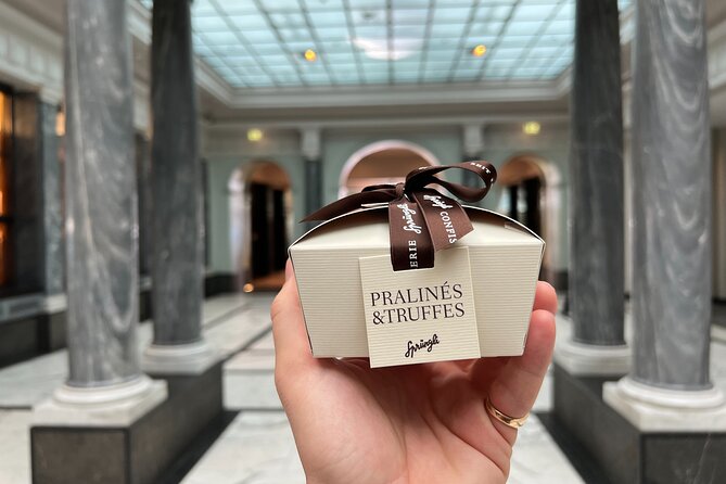 Zurich Food Tour with 10 Local Delicacies, Cheeses & Chocolates - Stop 4: Paradeplatz, Chocolate Craft, and Banking as a Story Thread