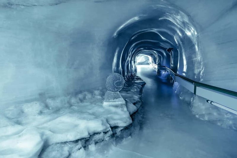 Zurich: Lucerne Trip, Igloo Fondue and Titlis Rotair Option - Ice Grotto in the glacier: a cool change from snowy outdoors