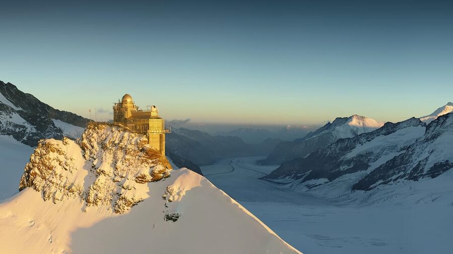 Zurich: Private tour to Interlaken, Grindelwald & Jungfrau - Grindelwald Village Stop: A Classic Alpine Base Before the Summit